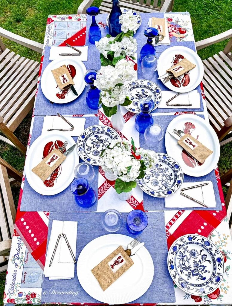 New England outdoor summer lobster styled table in Patriotic colors.