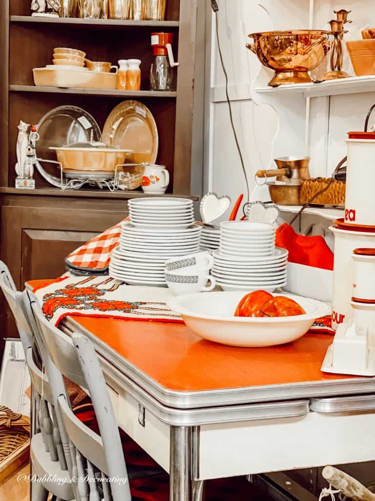 A kitchen with a plate of food on a table, with Design