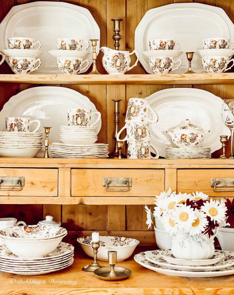 Johnson Brothers Autumn’s Delight- A Thrifted Dishware Set displayed in vintage pine hutch.