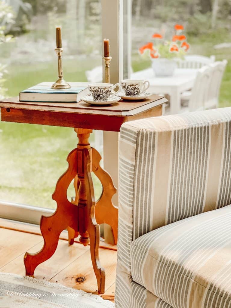 Vintage thrifted wooden table in Sunroom