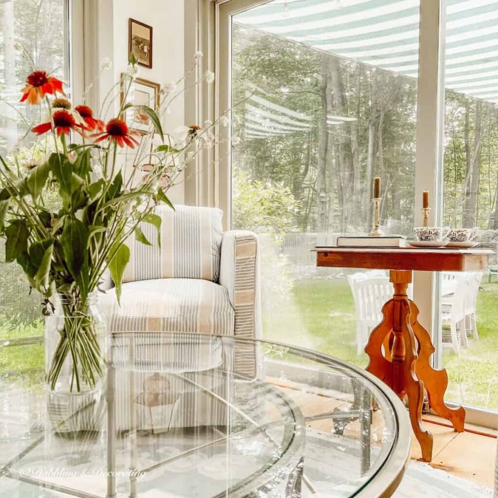 Vintage thrifted wooden table in Sunroom