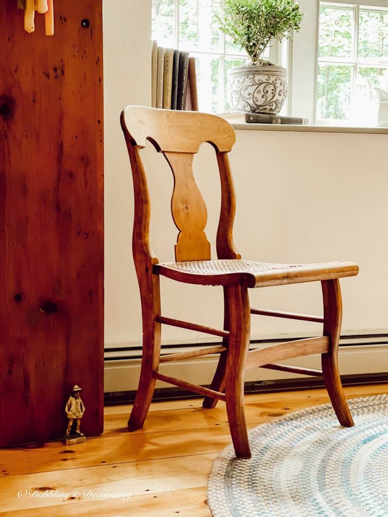 Vintage Dining room with cane chair.