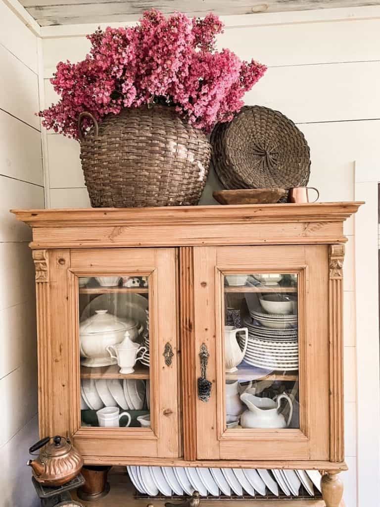 Pine cabinet with pink flowers