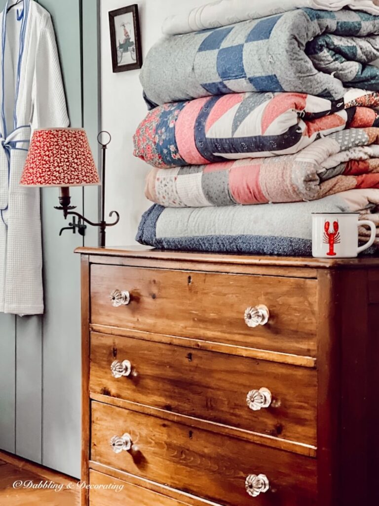 How not to fold quilts like blankets on dresser.