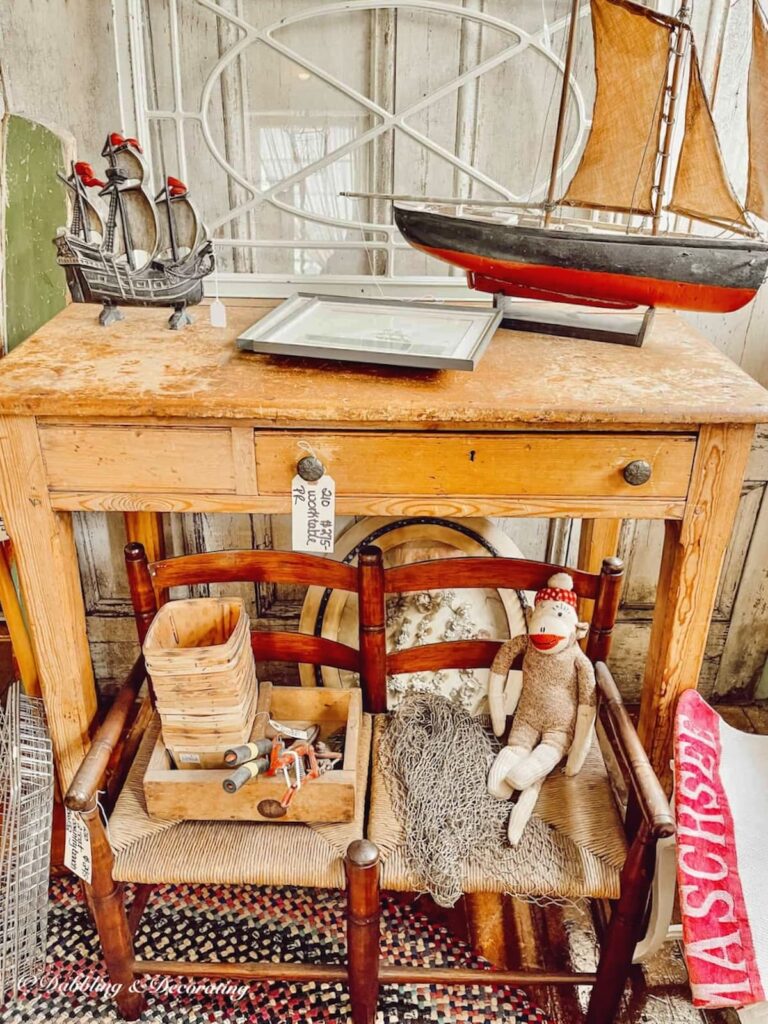 Antique Desk in pine on display in an antique shop.