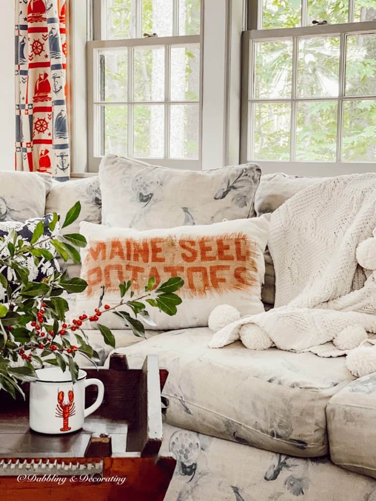 Drapes , pillows, couch and coffee table.  Fall colours.