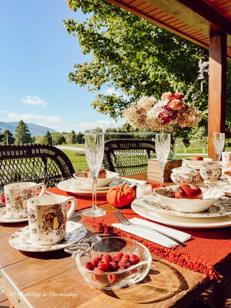 Johnson Brother's Autumn's Delight Fall Tablescape on the porch.