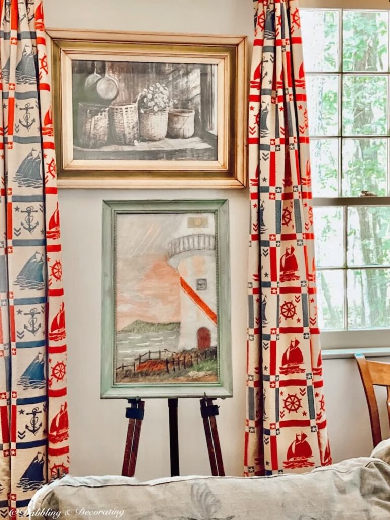 Vintage Coastal Curtains hanging in antique styled Maine home with lighthouse painting.
