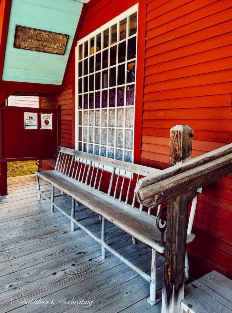 Antique outdoor bench on the porch of The Vermont Country Store in Weston, Vermont. Picture Perfect.