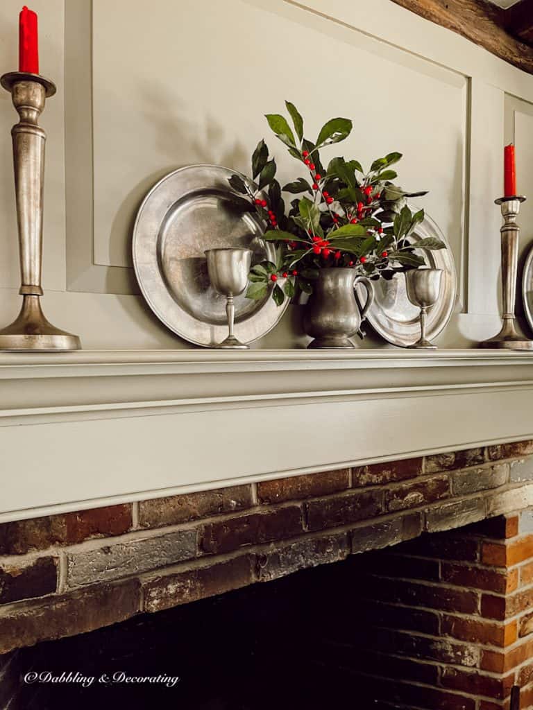 Colonial Styled mantel with antique pewter decor for the holidays.