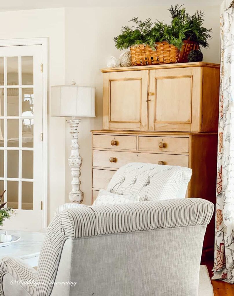 Conversation Room in open floor plan home with neutral and vintage furniture details.