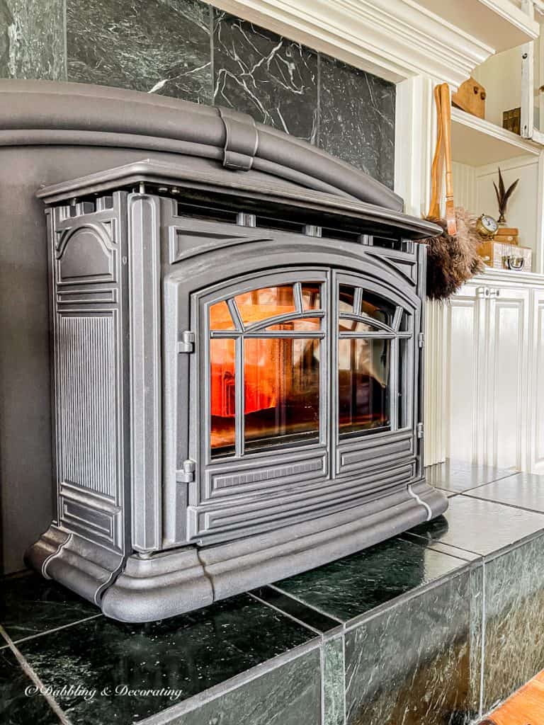 cozy ski lodge fireplace with pellet stove insert.