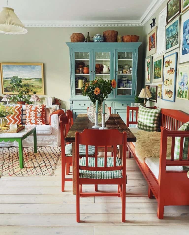 Colorful eclectic Swedish home with open dining room and living room.