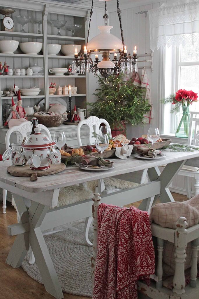 Scandinavian farmhouse Christmas decoration in dining room.