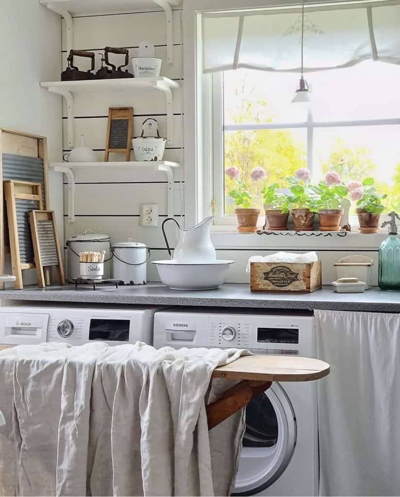Vintage ironing board in Scandinavian home's kitchen.