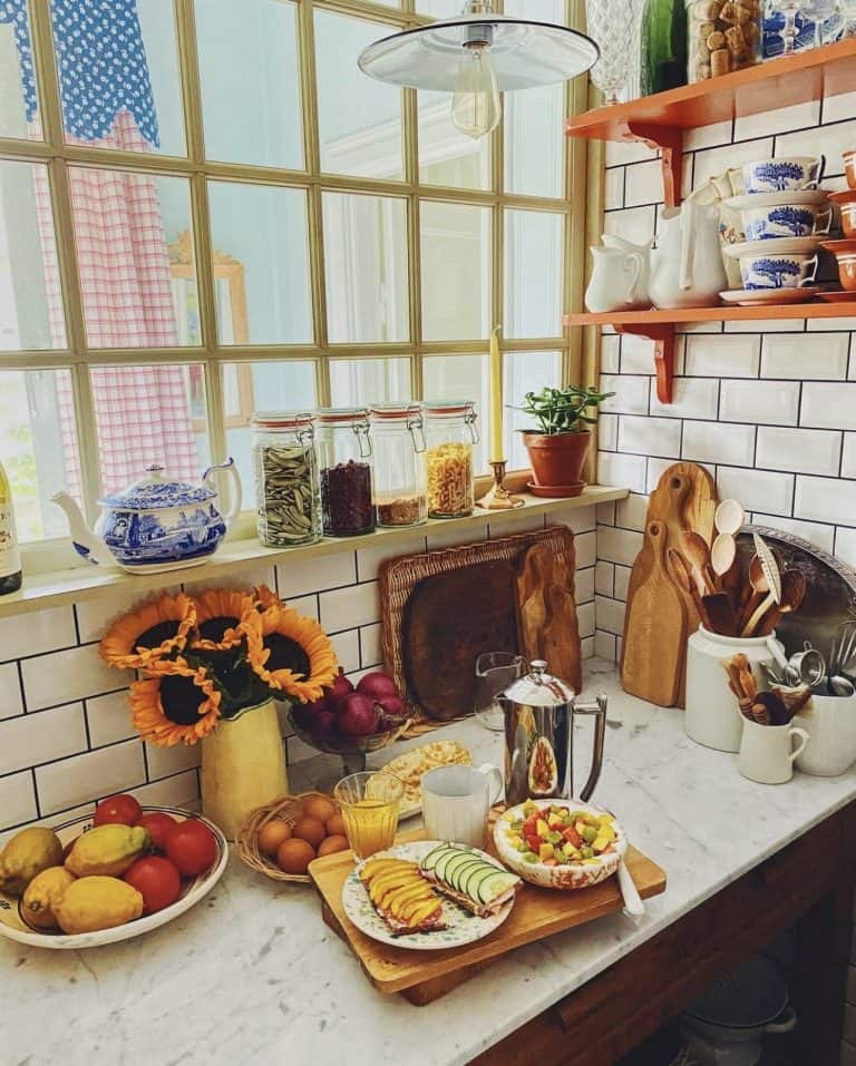 Eclectic colorful kitchen with breakfast waiting in Swedish home.