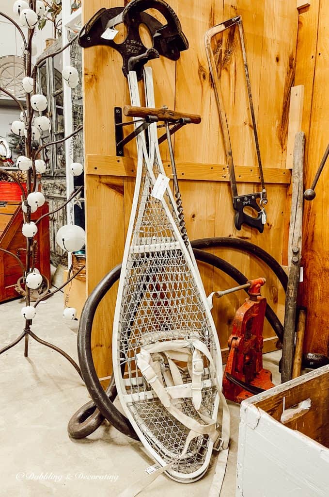 Vintage white ski lodge decor in antique store.