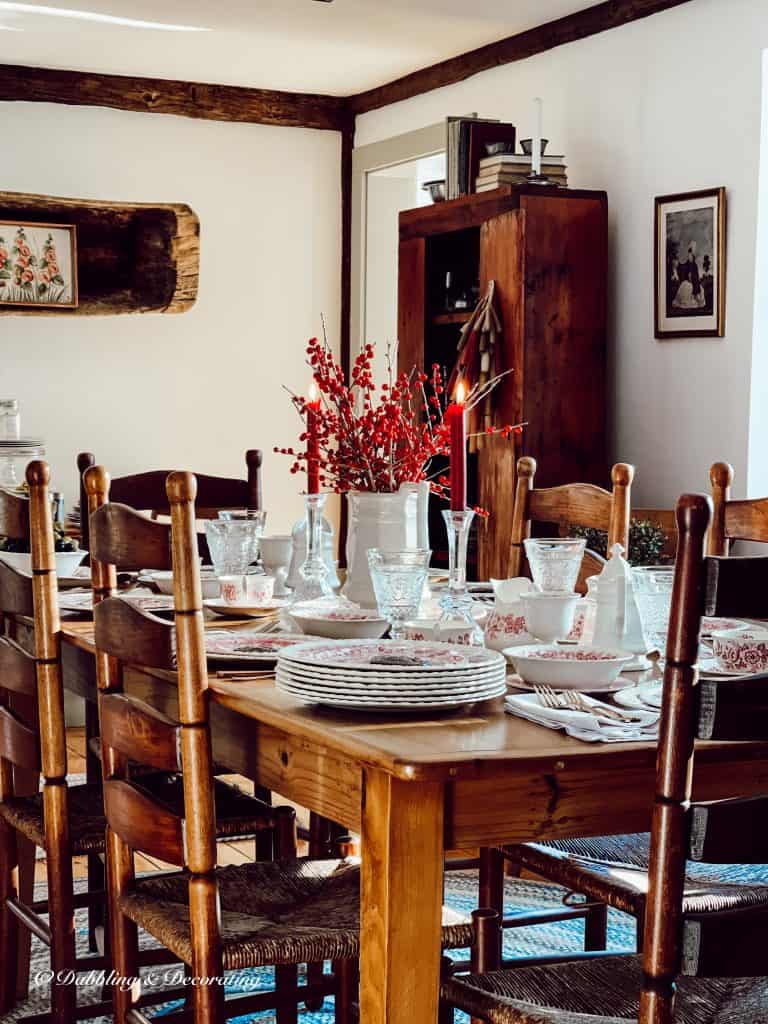 Dining Room Table and Chairs decorated with thrifting trends, dishwares.