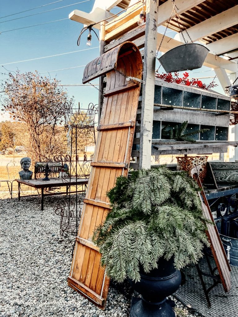 Vintage wooden toboggan sled at flea market.