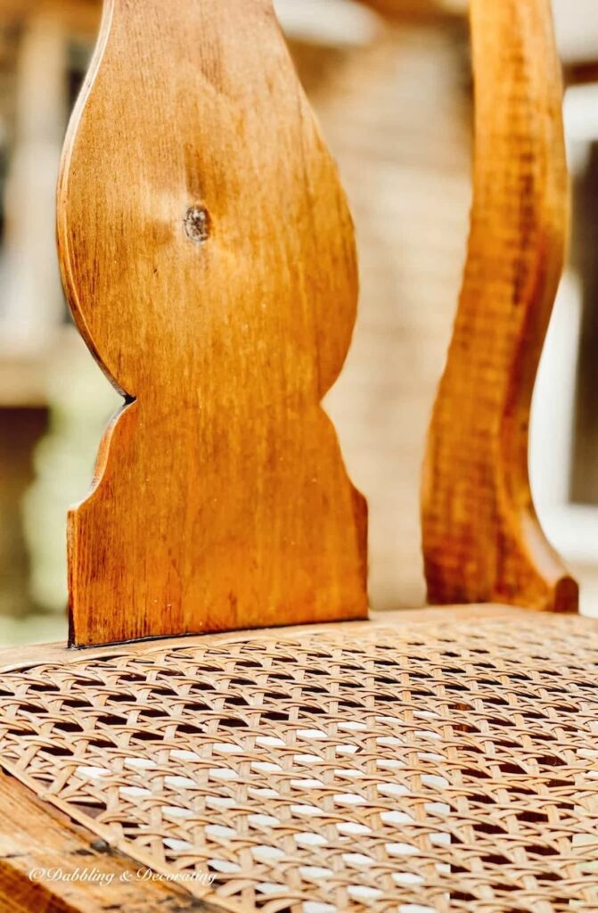 Close up of antique cane chair caning on seat.