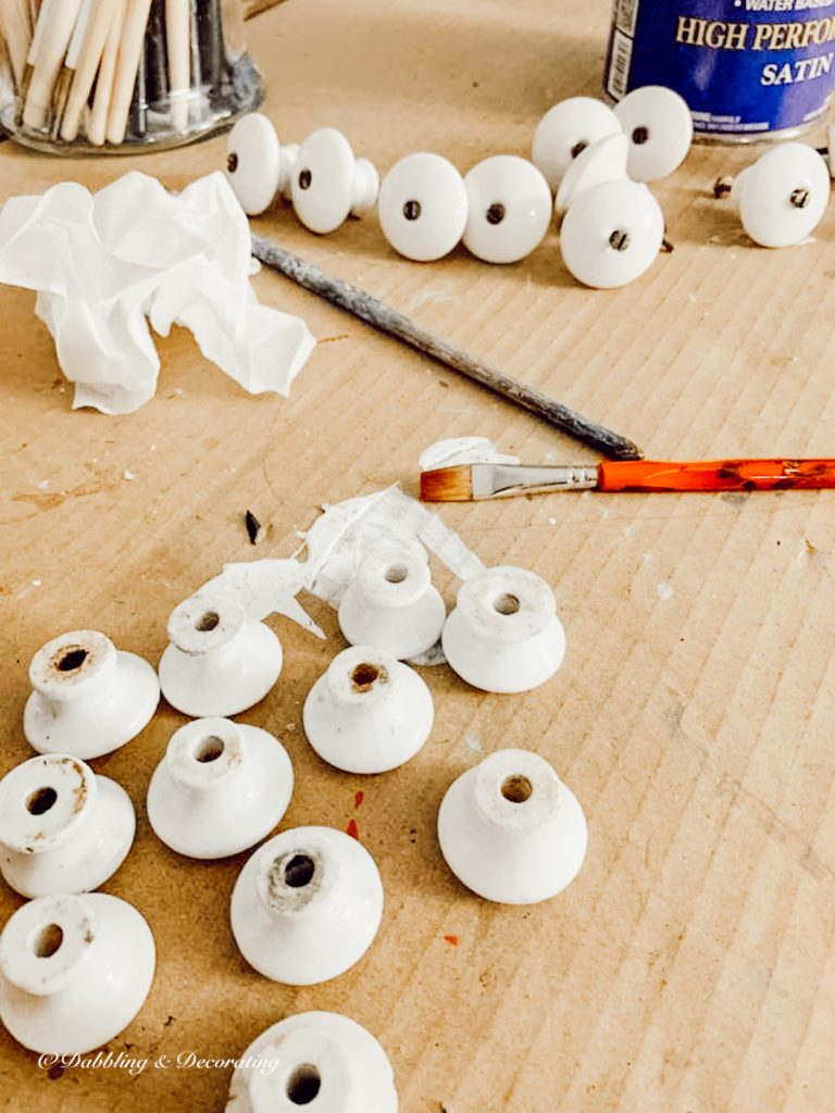 White vintage hutch knobs.