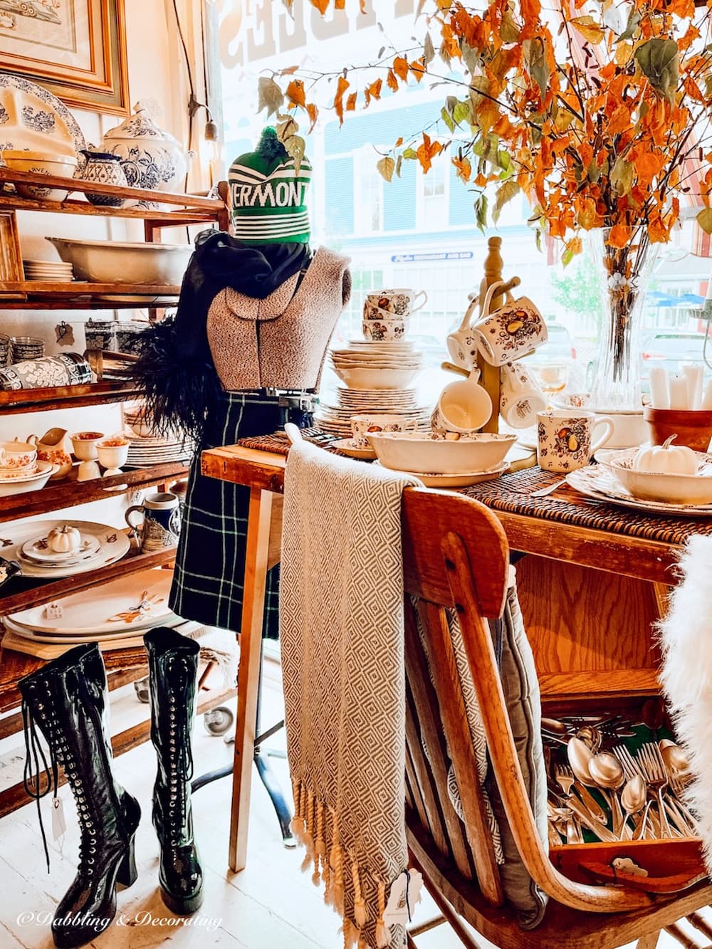 Fall inspired vintage booth display in the window.