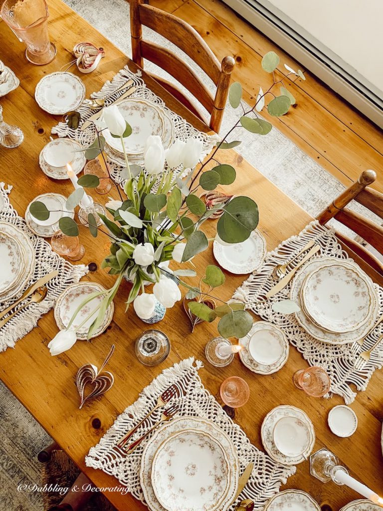 Spring White tulip centerpiece on vintage style spring table setting.