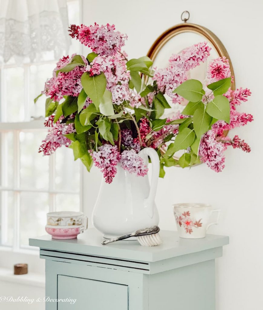 Lilac bouquet in bathroom