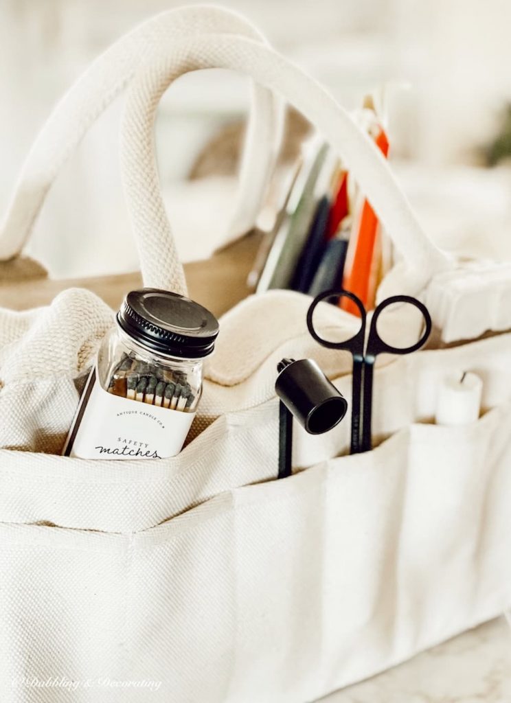 Safety Matches and Candle Snuffer close up in white canvas bag. How to store candles?