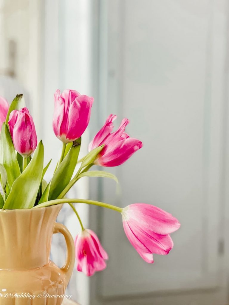 Pink Tulips in vintage vase.