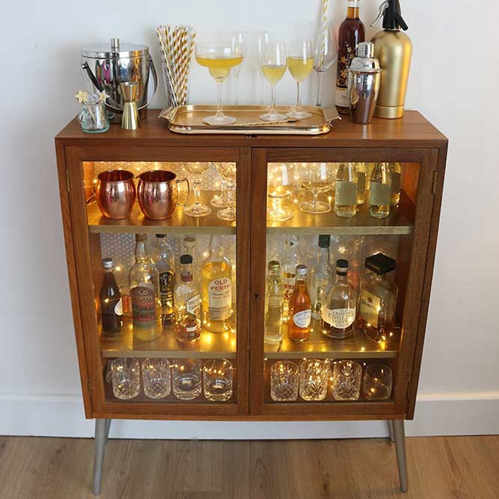 Bookcase turned retro cocktail cabinet.