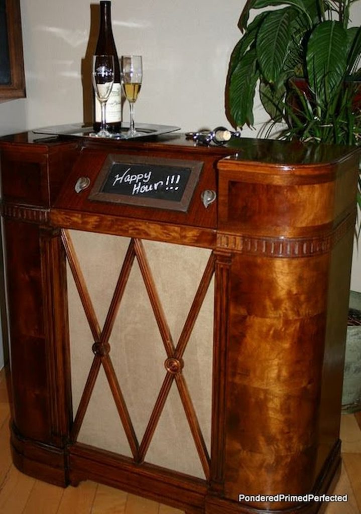 Upcycled Radio Cabinet into vintage bar.