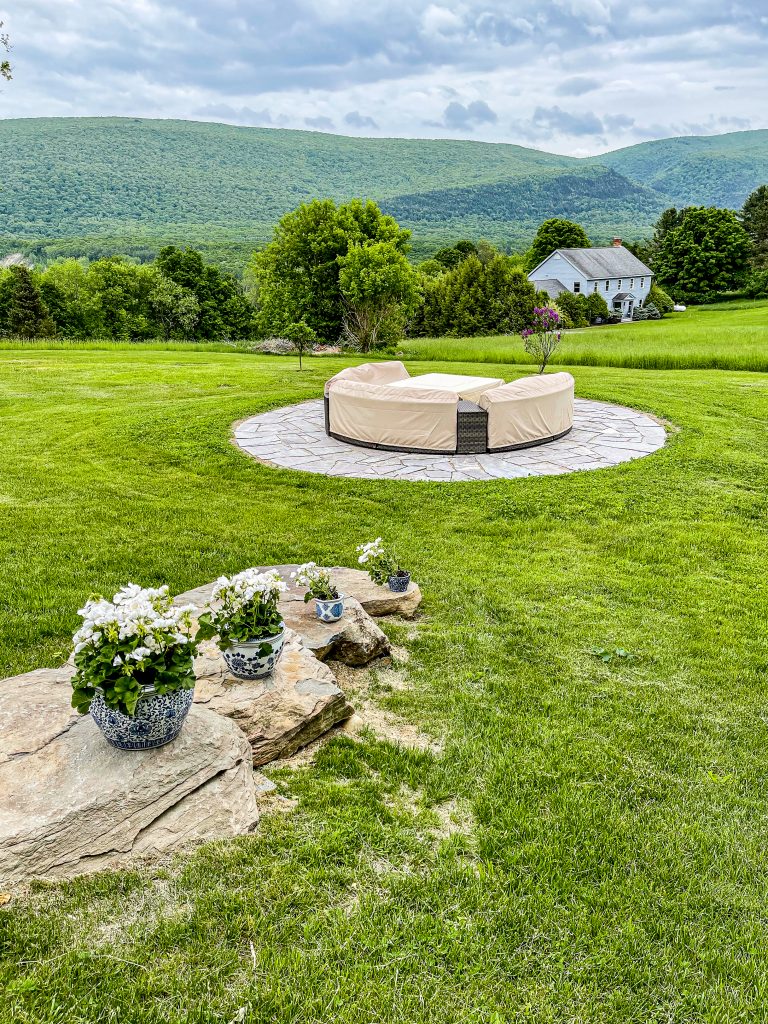 Backyard Living Space with Covered Fire Pit and Stone stairs.