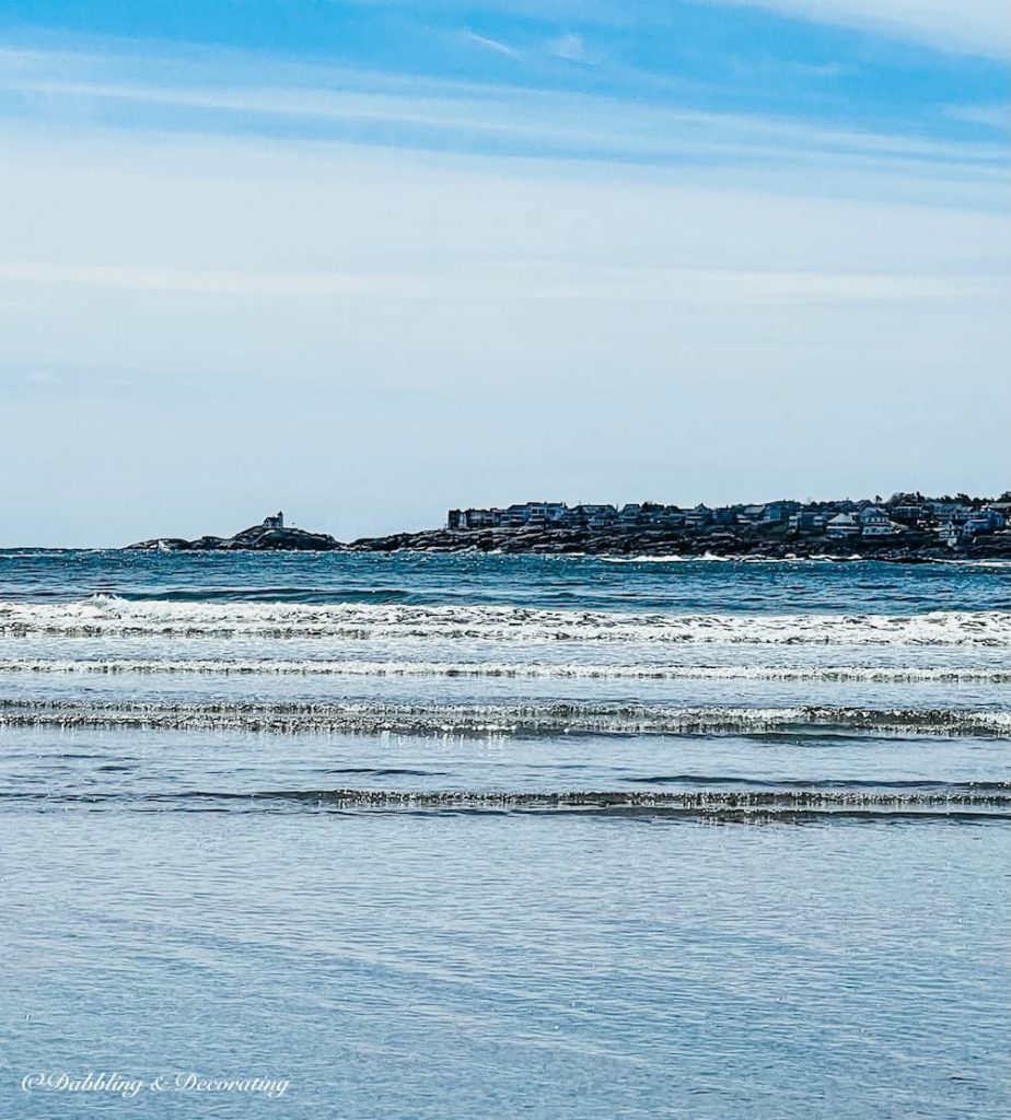 View of Nubble Light House from Cape Neddick, Maine Beach.