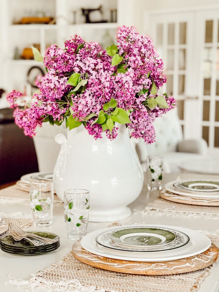 Spring Floral arrangement centerpiece on farmhouse table.