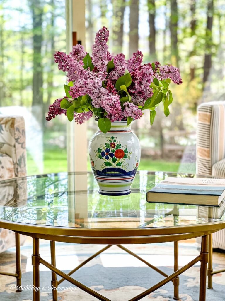 Lilac Bouquet on Glass Coffee Table in Sunroom