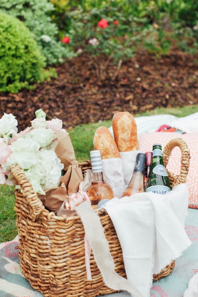 Elegant picnic basket filled cuisine.