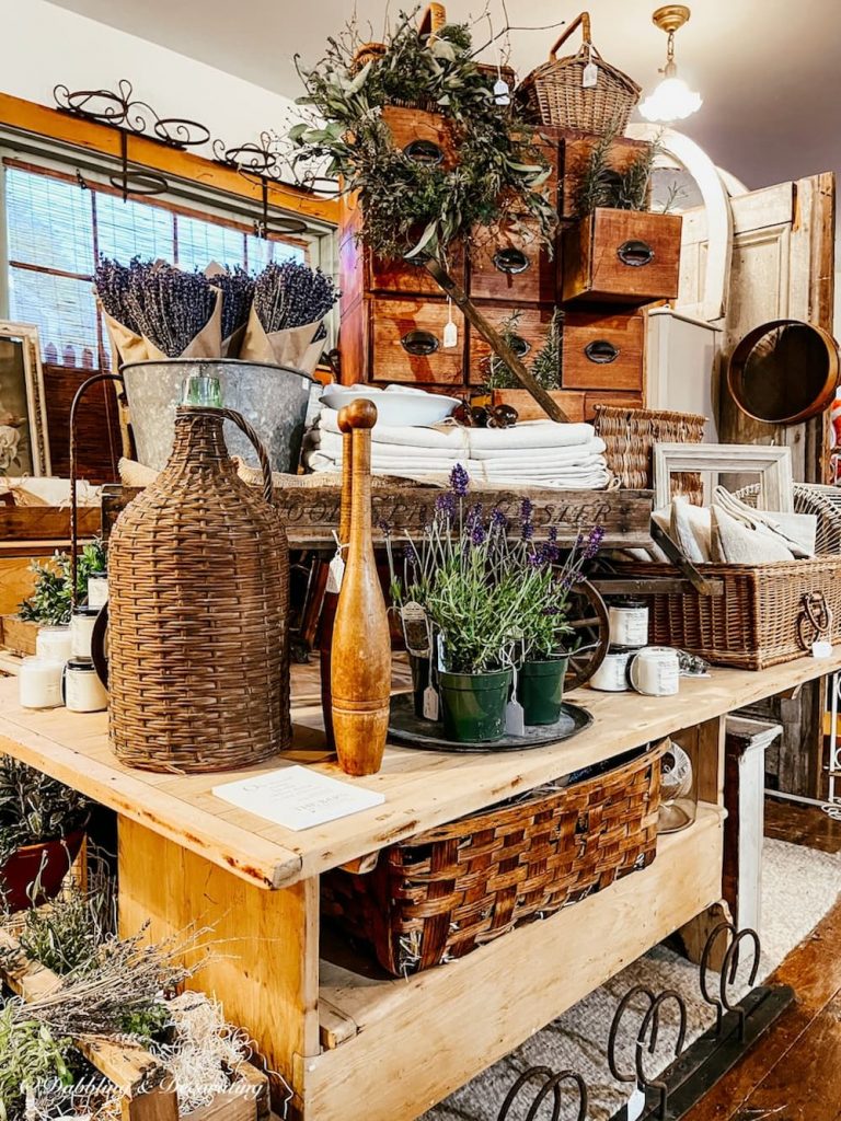 A store with a lot of vintage wicker baskets for thrifty decorating.