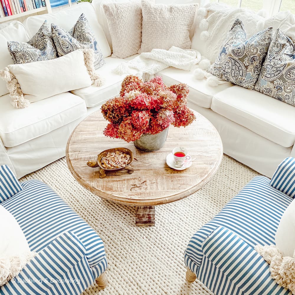 Hydrangeas coffee table centerpiece in sunroom.