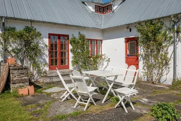 Scandinavian cottage outdoor patio area.