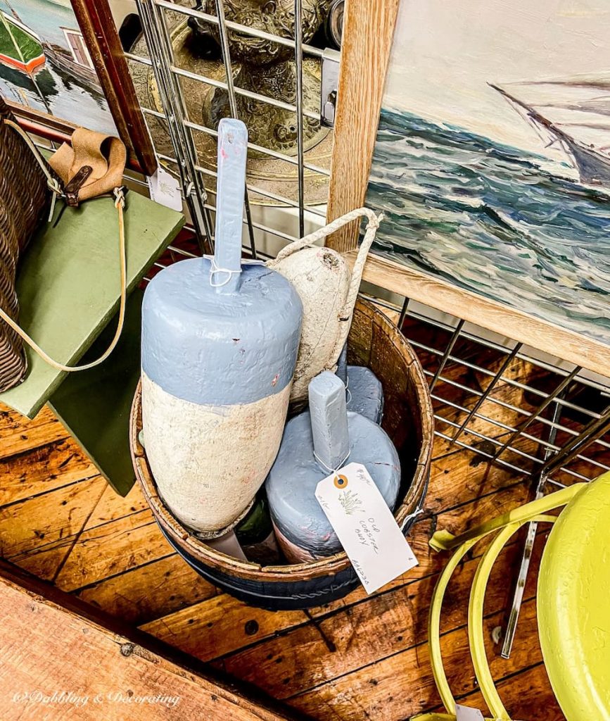 Lobster Buoys in barrel in antique store.  Make great gifts from Maine.