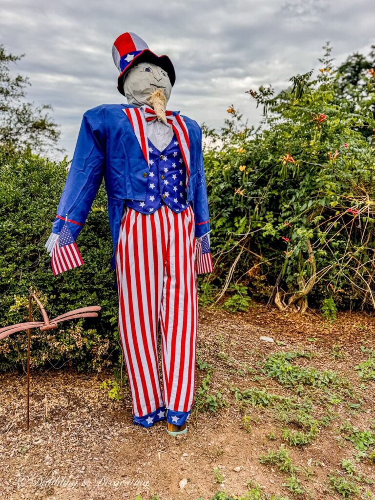 Uncle Sam as a scarecrow in a Vermont field for fall decoration.