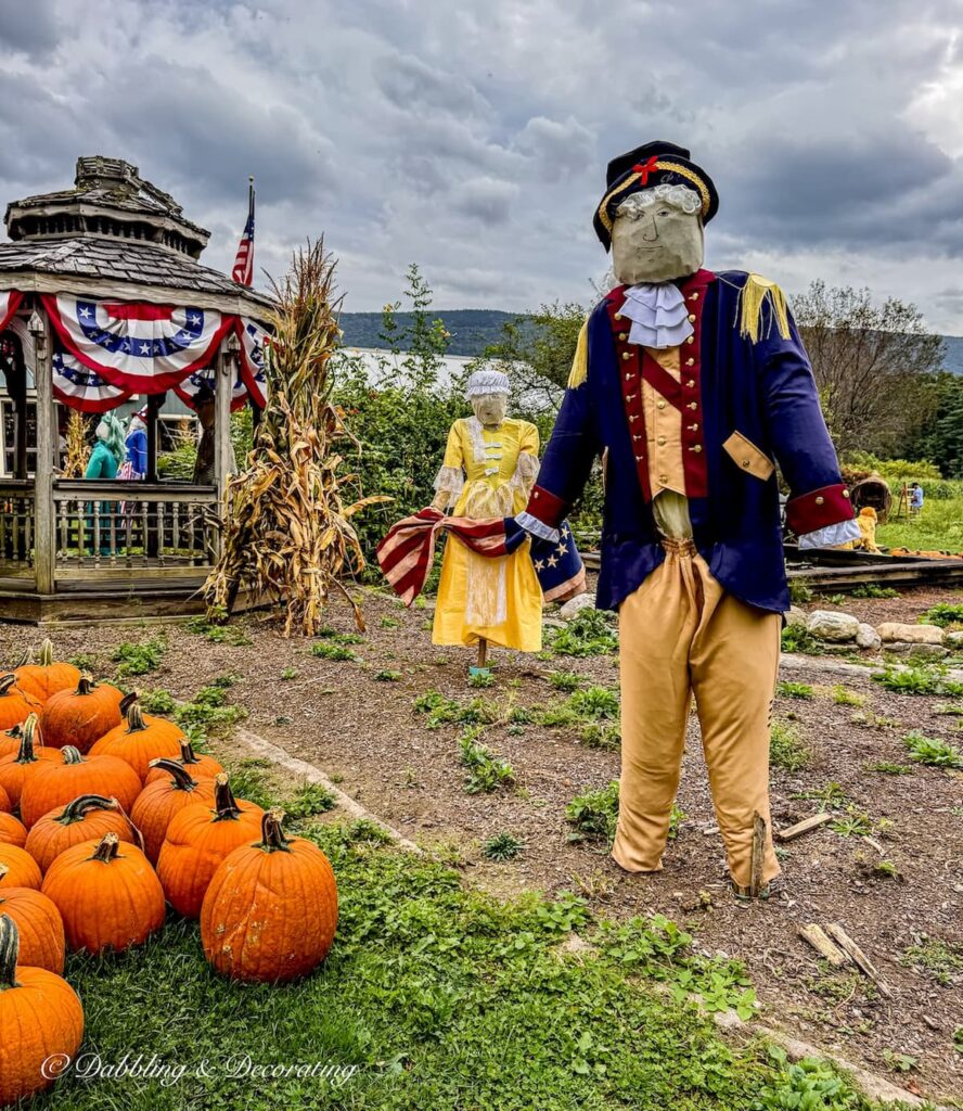 George Washington and Betsy Ross perhaps as funny scarecrows in a Vermont field as fall garden decorations.