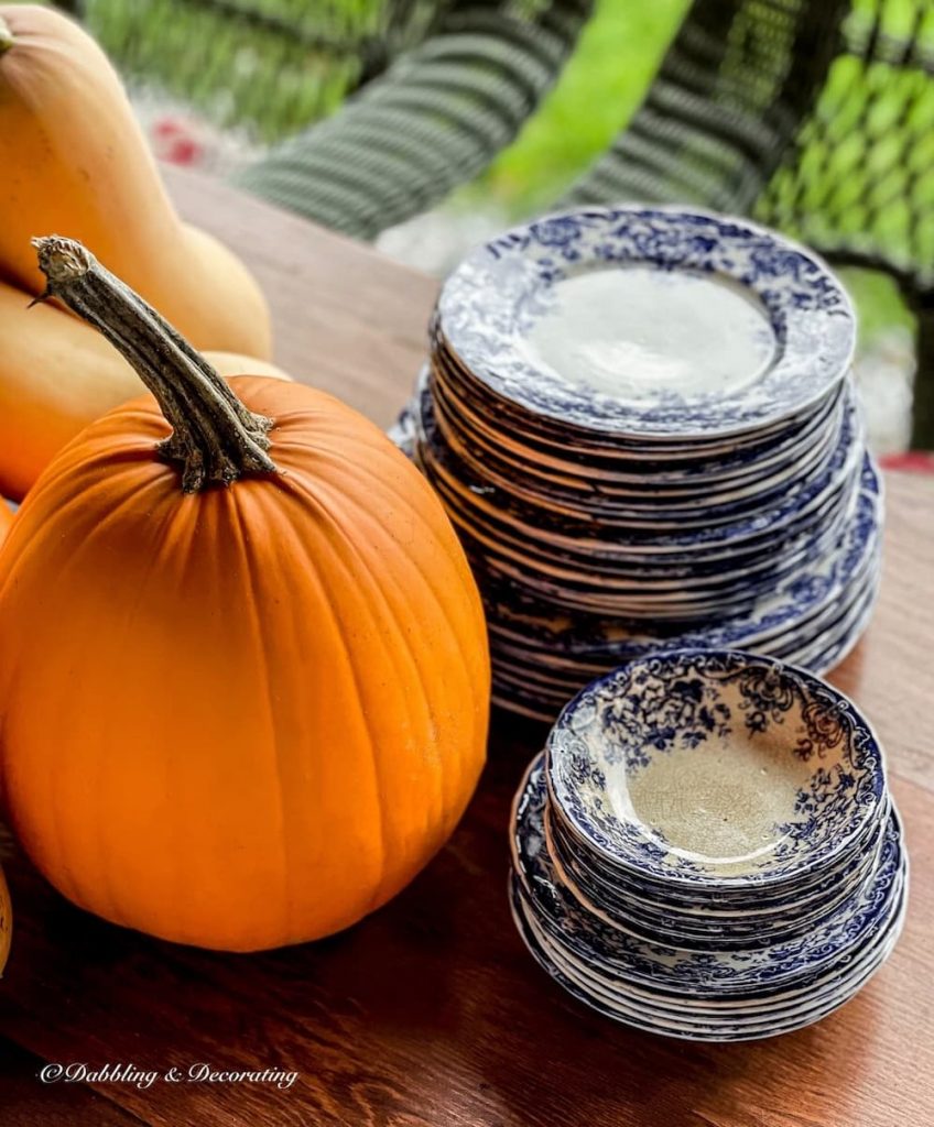 Stack of vintage blue dishes.