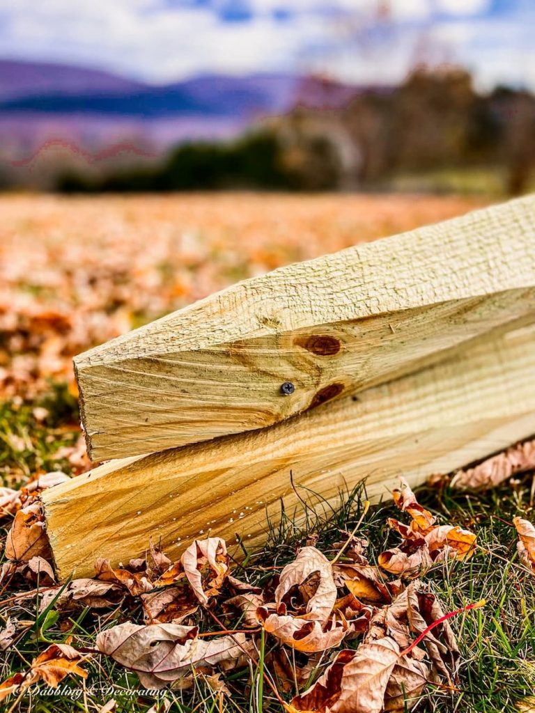 wooden post and rail fence close up