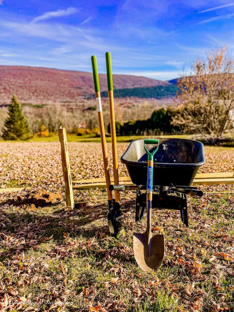 Wheelbarrow with tools in the mountains.