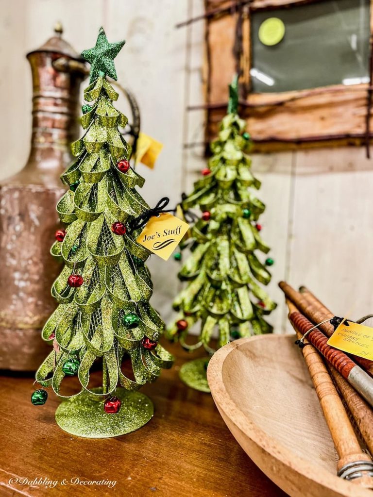 Two figurine Christmas Trees
