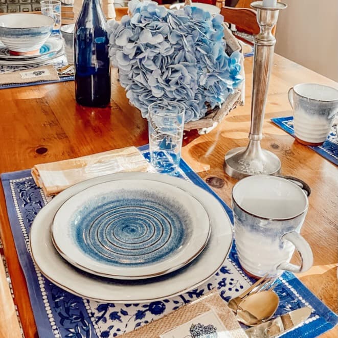 Coastal vintage glassware on table setting.