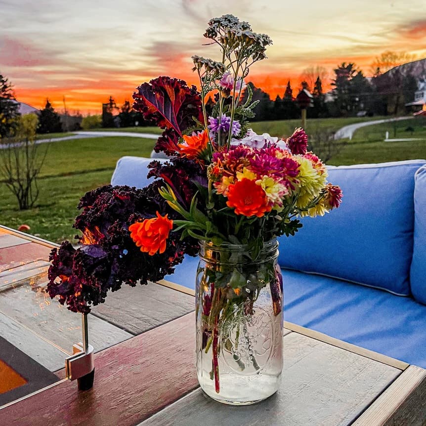 Bouquet of Flowers at Fire Pit neighborhood gathering in unseasonably warm November in Vermont.