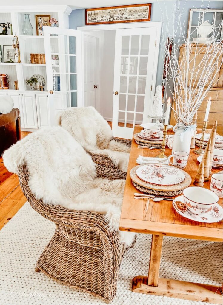 Cozy Winter Dining Room with Ski Lodge Decor and Sherwin Williams Stardew wall color.